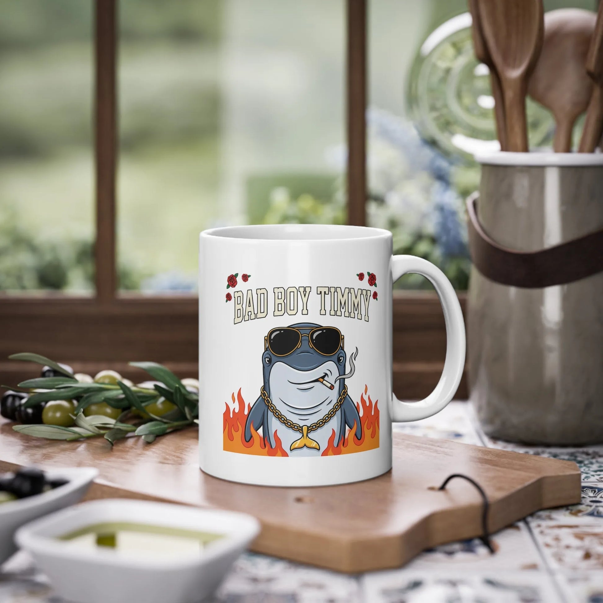 White ceramic mug featuring the Bad Boy Timmy graphic, a cool shark with sunglasses and a flame design, dishwasher safe and spülmaschinenfest.